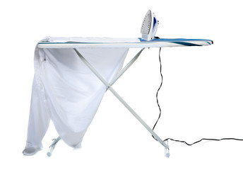 An ironing board with a shirt and an iron - household chores