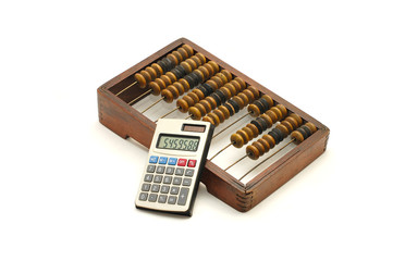 Abacus and calculator on white background