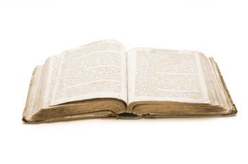 Old open book isolated on white