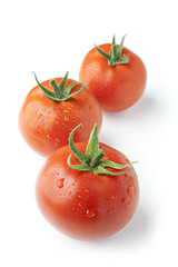 Three Water Covered  Tomatoes