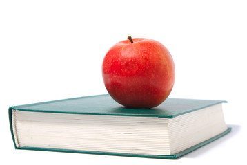 red apple and green book