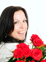 smiling brunette woman with bouquet of flowers