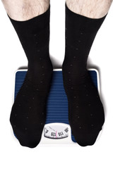 füße in socken auf waage