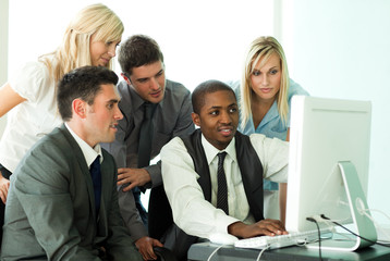 Ethnic business team working in office