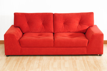 Red sofa with copy space.