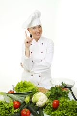 Attractive cook woman a over white background