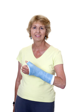 Senior woman with arm in blue cast
