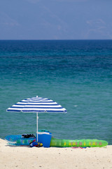 Umbrella on a sandy beach.