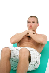 Fitness man doing situps