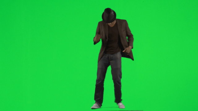 Young man with hat and dancing