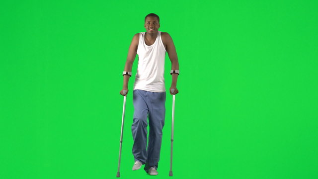 Young man with crutch