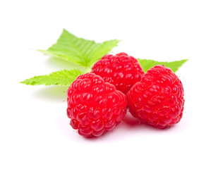 Raspberries with green leaves