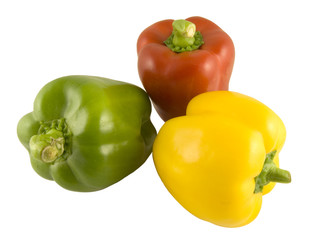 red, green and yellow peppers isolated on white background
