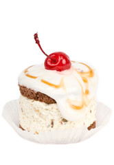 One cake with cream and cherry on top