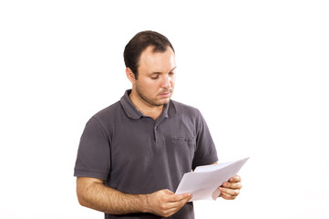 young man reading document