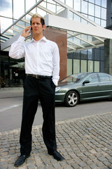 Attractive Young Businessman On Cellphone