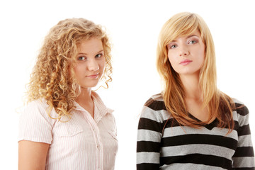 Two beautiful blond teen girlfriends