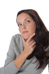 Beautiful brown hair woman watching up thinking