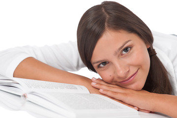 Obraz premium Portrait of teenager reading book