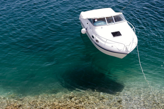 Boat on the crystal clear sea