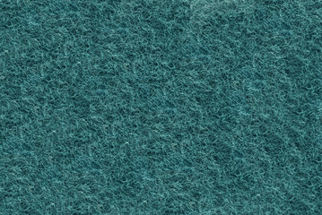 Close-up of Teal synthetic fibrous surface