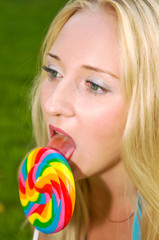 young woman with lollypop