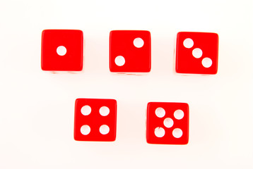 Five dice on a white background