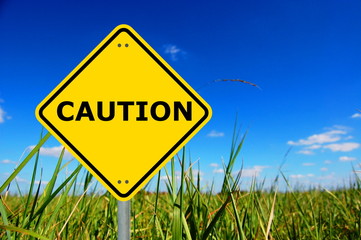 yellow caution sign