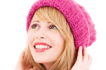 happy teenage girl in hat