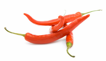 Brightly-red cayenne on a white background