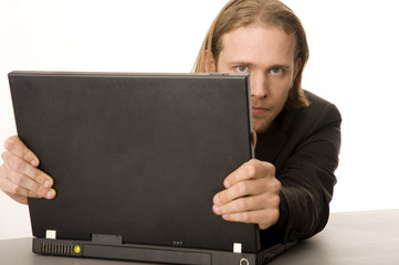 Mann mit Laptop