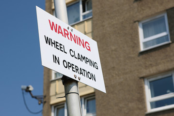 Obraz premium Wheel Clamping Warning Sign