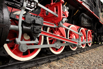 Red wheels of the old express steam train