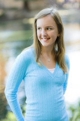 Portrait Of Pre Teen Girl By Lake