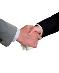 man's handshake and the transfer of money