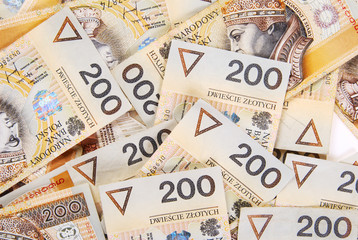 background made of polish 200 zloty banknotes
