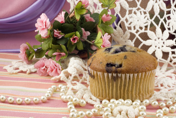 Blueberry Muffin on Vintage Background