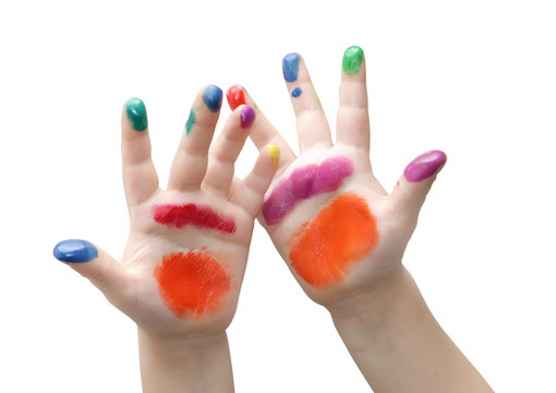 Child hands painted in colorful paints