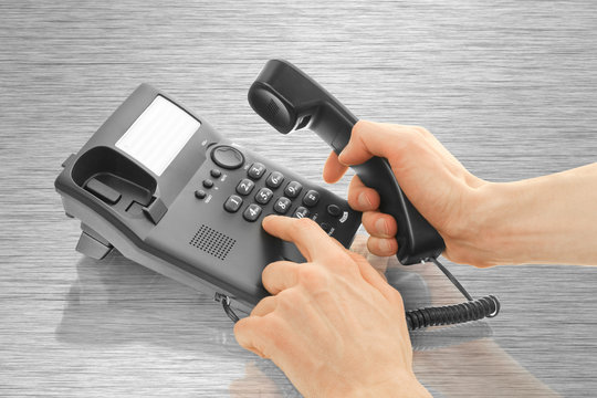 office telephone with hands