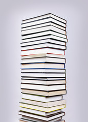 A big tower of many books vertical