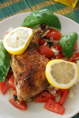 grilled chicken with organic tomato salad and lemon