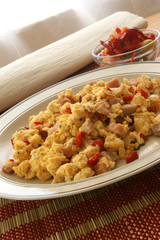 scrambled eggs with organic tomato and bacon