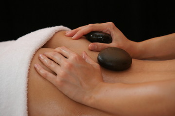 Obraz na płótnie Canvas Hot Stone Massage