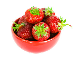 strawberry on red plate over white background