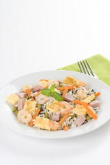 Plate of shrimp fried rice peas ham omelette
