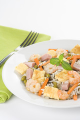 Plate of shrimp fried rice peas ham omelette