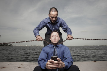 Businessman trying to kill the other businessman