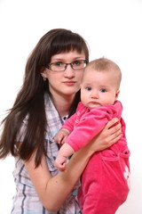 The young woman in points holds the kid