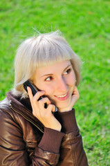 Woman using mobile phone outdoors