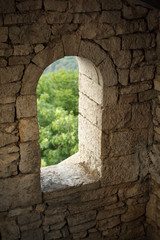 window in stone wall